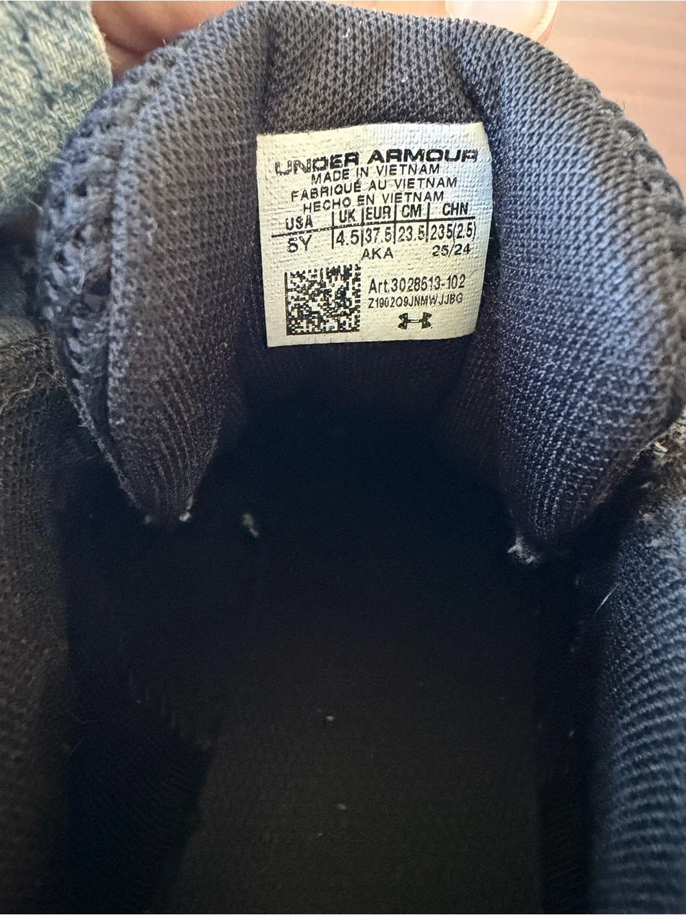 Under Armour Kids Black and White Athletic Sneakers
